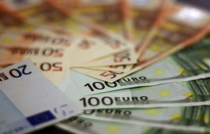 Closeup on pile of euro banknotes. Free public domain CC0 image.